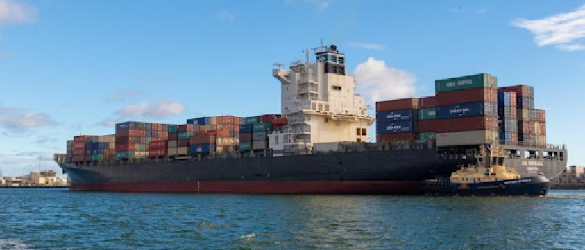 A container ship docked in a harbor