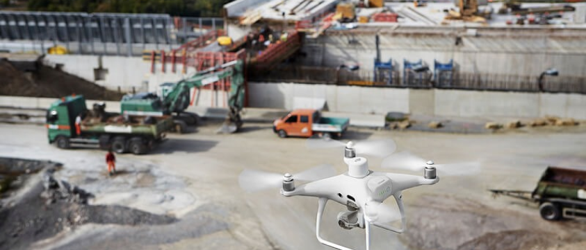 A drone flying over a construction site