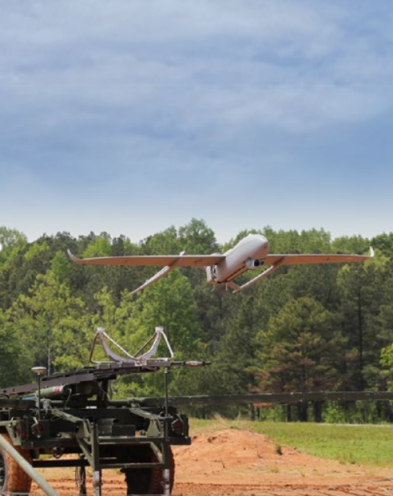 A drone flying over a field